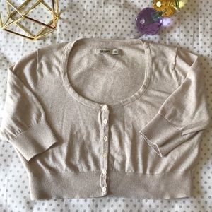 cream colored cropped sweater